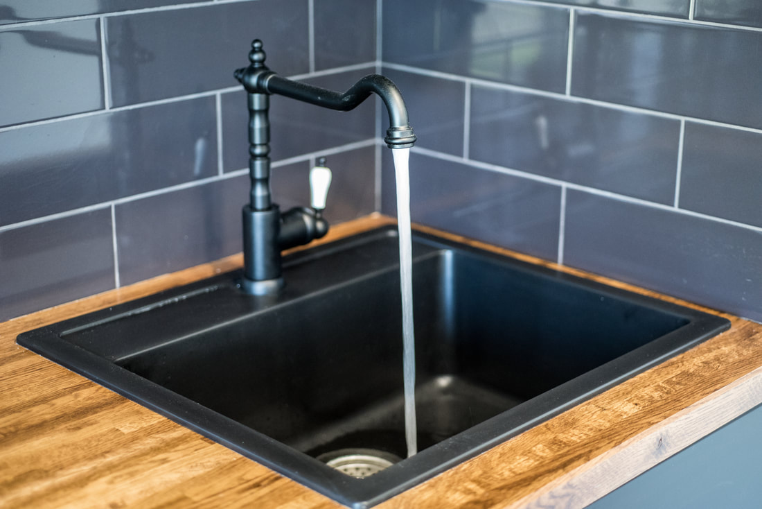 black sink and faucet