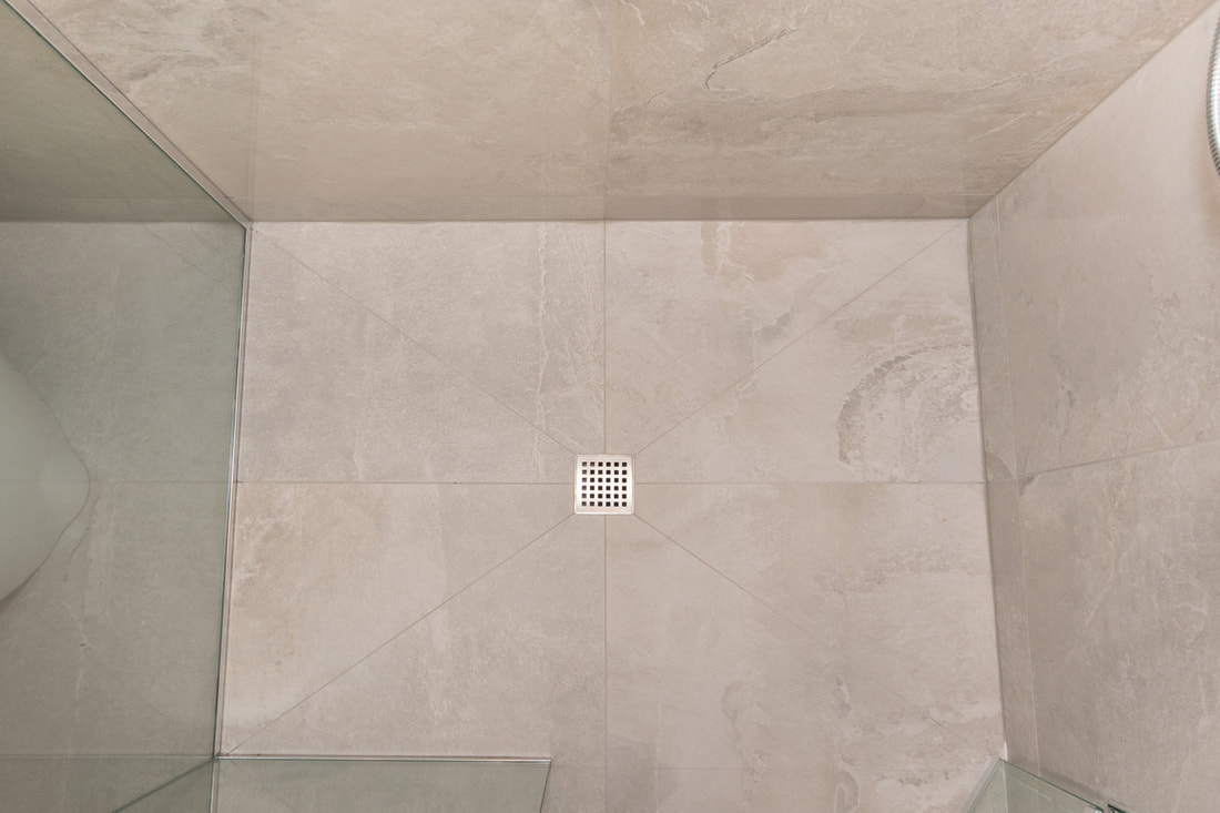 large format tiles in shower stall